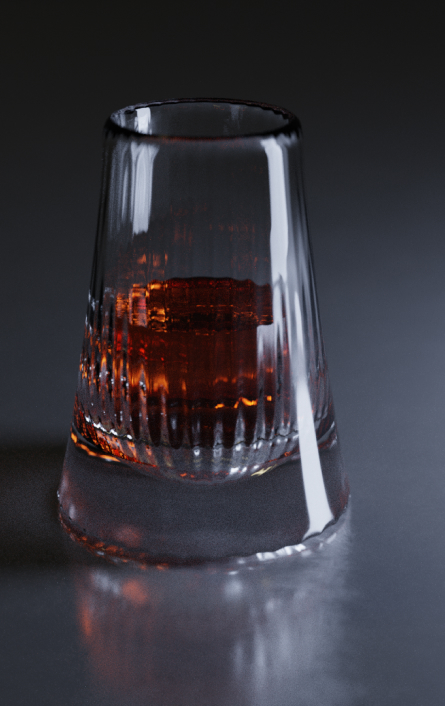 vaso hecho a base de geometria con líquido color caramelo en su interior
